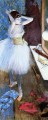 dancer in her dressing room Edgar Degas